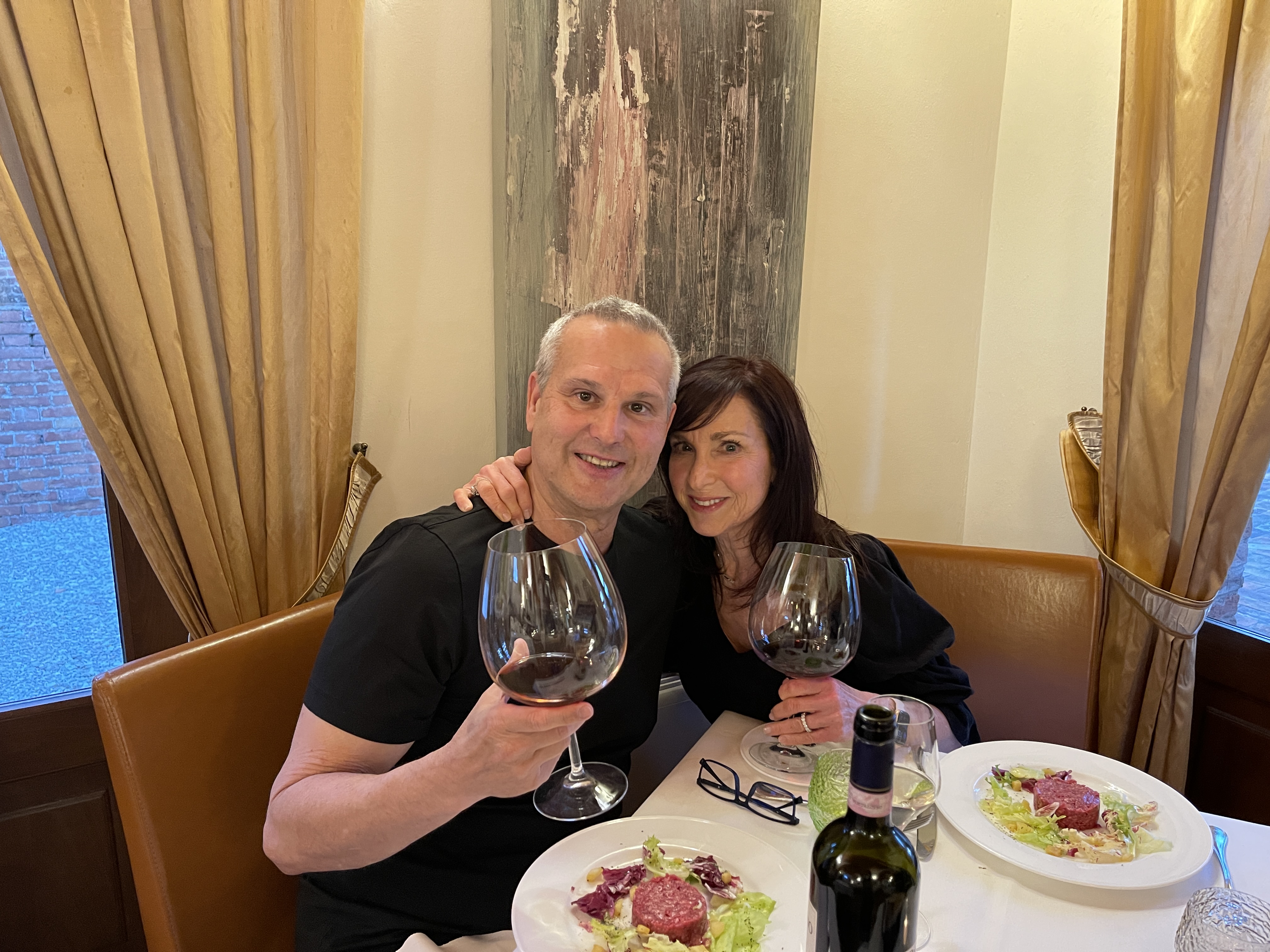 Ivan and partner dining with wine